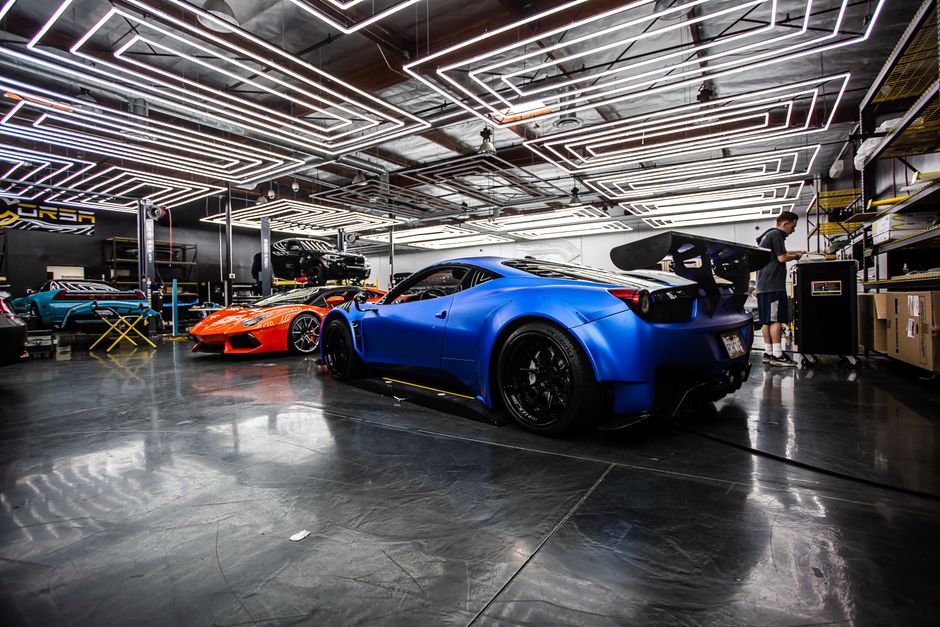 Professional automotive detailing technician at work, showcasing quality car care service and expertise